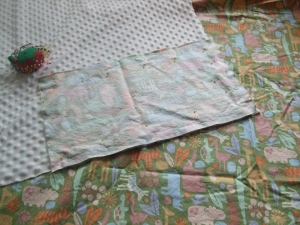 Pinning and cutting the two fabrics for the burp clothes